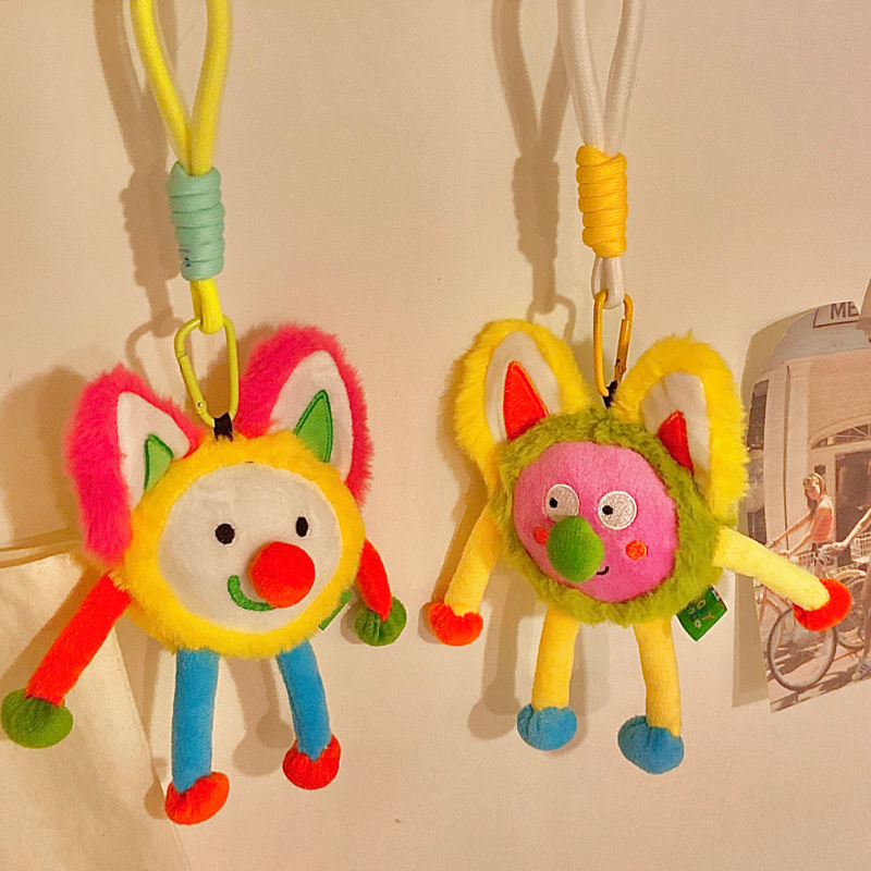 Plush critter keychain in a riot of candy colors with wiggly limbs