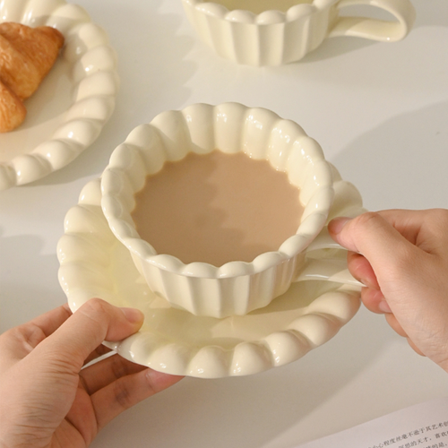 Duo of scalloped ceramic cups with pillowy, patisserie-window charm