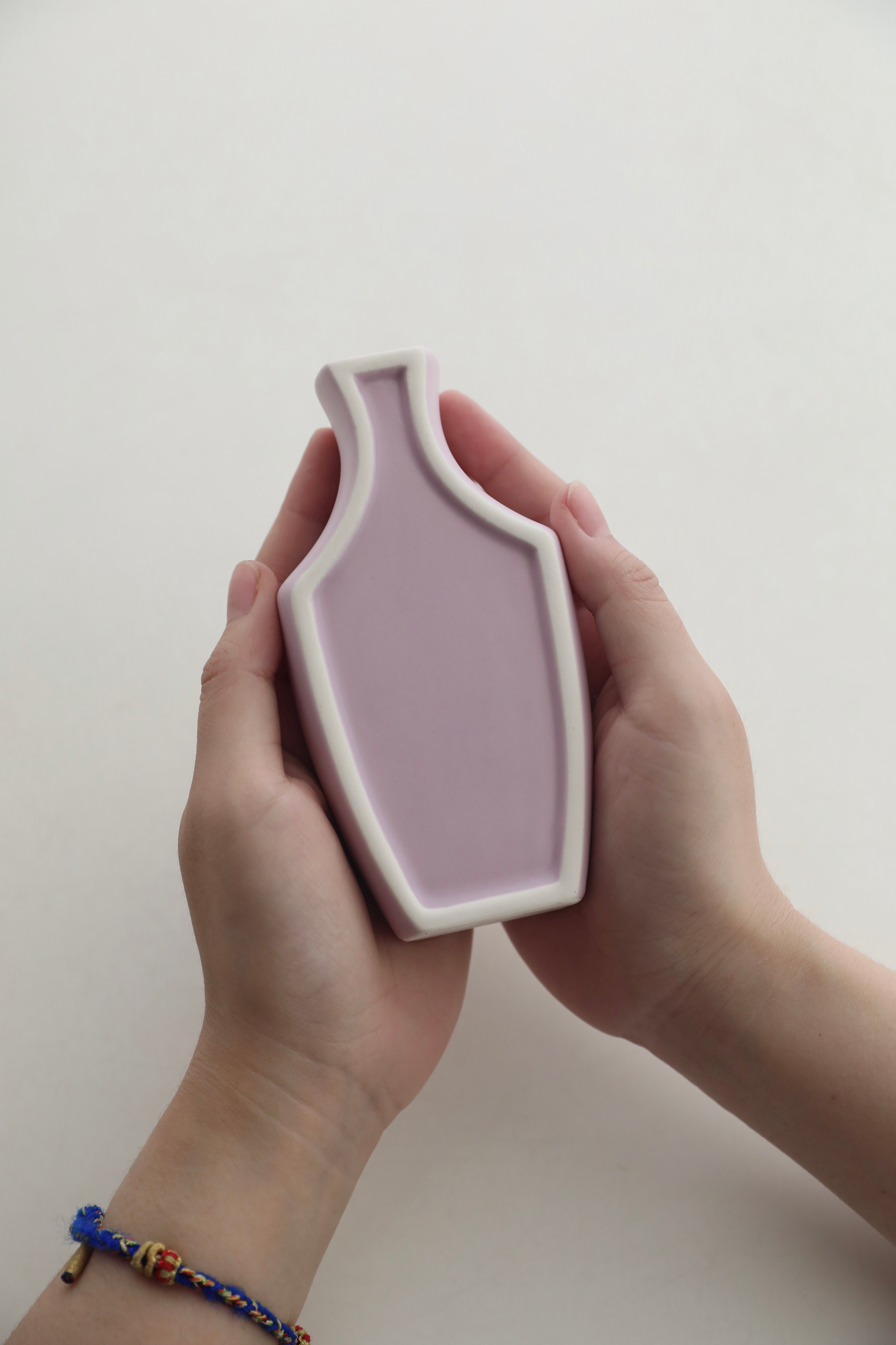 Mini ceramic vase with clean architectural lines and a matte pastel finish