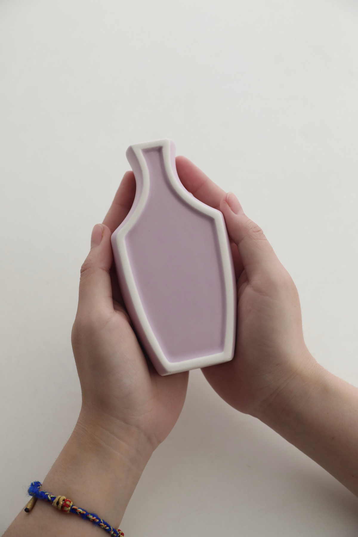 Mini ceramic vase with clean architectural lines and a matte pastel finish