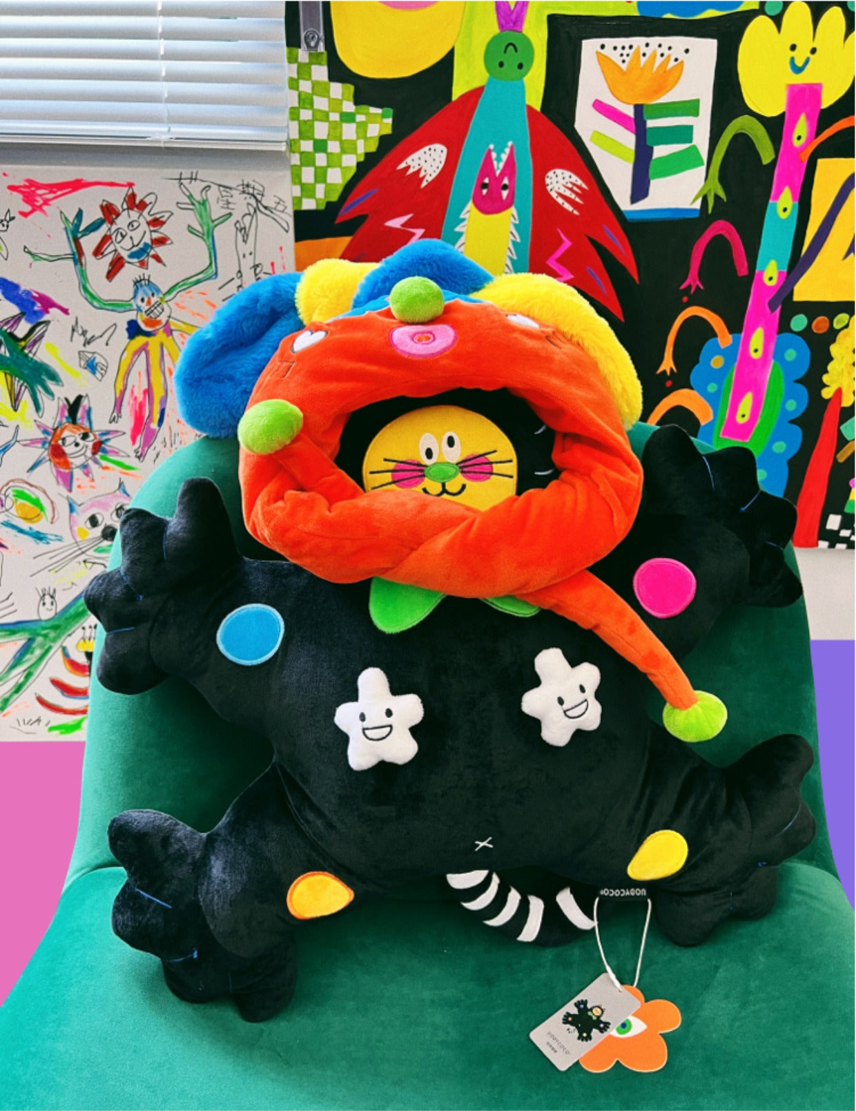Polka-dotted cat plush with velvet paws spread wide like wings