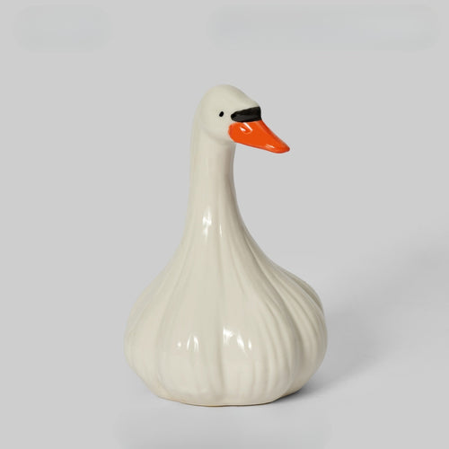Ceramic duck figurine shaped like a bulb of garlic, genuinely strange and genuinely charming