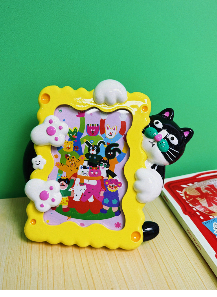 Flamboyant wooden cat photo frame, paws everywhere, mid-photobomb